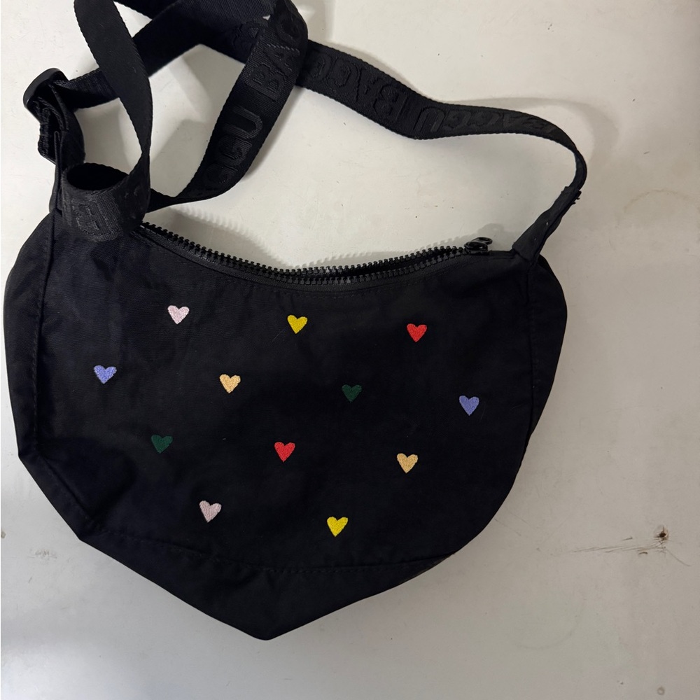 Baggu small Nylon Crescent bag with hearts.